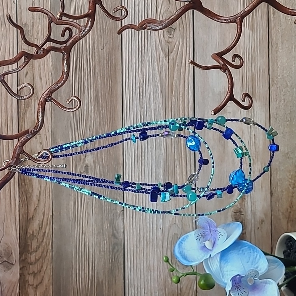 FIVE STRAND BLUE AND GREEN BEADED NECKLACE